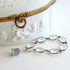 #3 Key to Your Heart Bracelet - Rock Crystal Sterling Silver Heart Bell Charm
