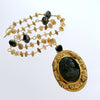 #1 Cari Necklace - Amber Quartz Onyx Antique Onyx Foliate Cameo Brooch